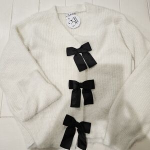 Elegant White Cardigan with Black Bow Details